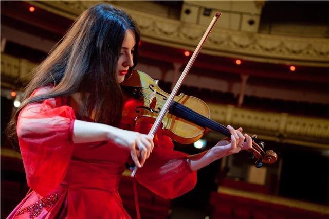 Violin and teacher ready to teach with love